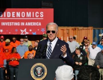 President Biden speaks at a podium