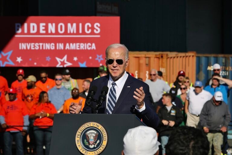 President Biden speaks at a podium