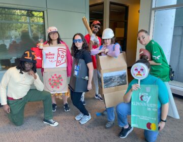 Billy Penn staff members dressed up in halloween costumes.