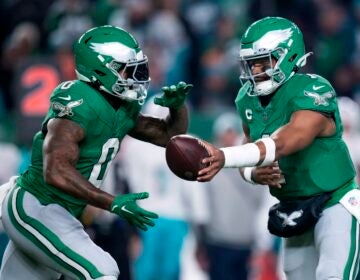 Eagles quarterback Jalen Hurts (1) hands off to Eagles running back D'Andre Swift (0) during the first half against the Miami Dolphins on Sunday, Oct. 22, 2023, in Philadelphia.