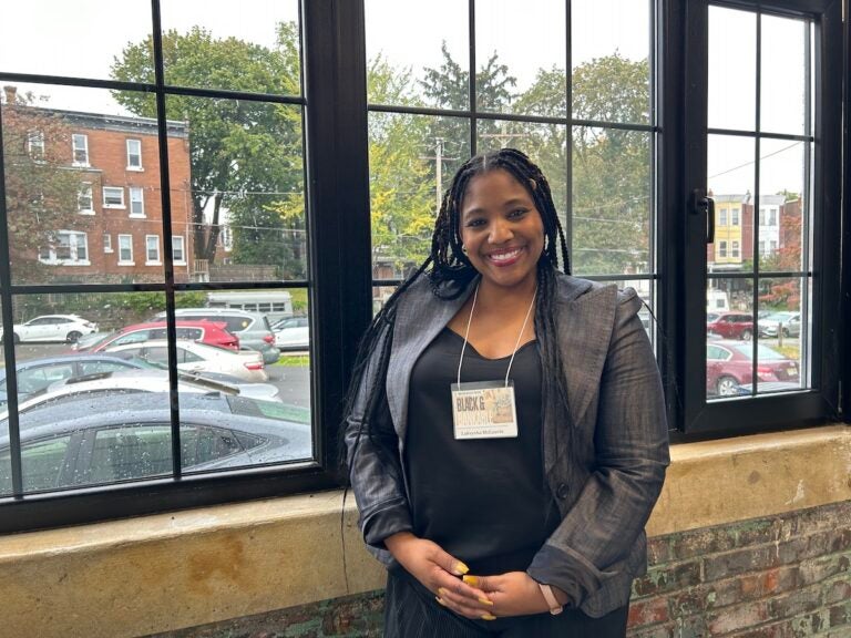 LaKeysha Jean poses for a photo at a window