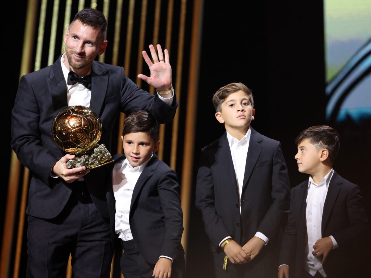 Lionel Messi accepted his eighth Ballon d'Or trophy, and was joined by his sons at the awards ceremony in Paris.