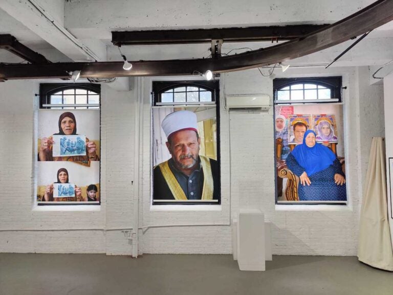 Photos of Palestinians displayed on a wall