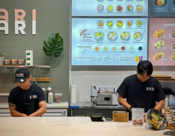 Proprietor Youngnam Kwon (right) and staff at Mari Mari in Center City, which he opened three years after launching a stand in H Mart following decades training in restaurants in Korea and NYC.