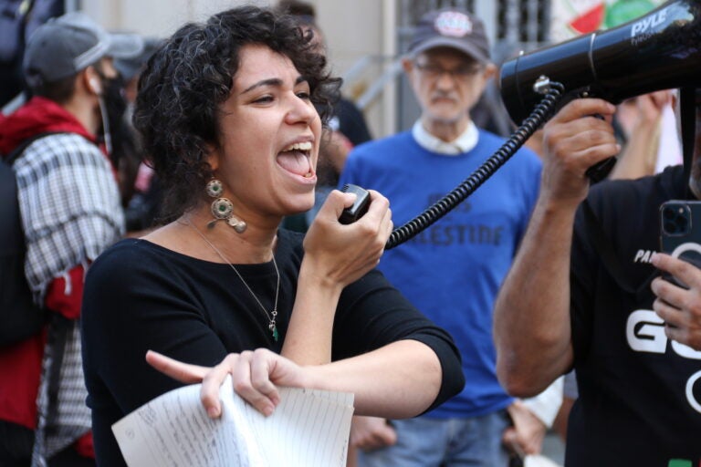 A person speaking into a megaphone