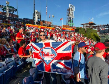 Dave Shaw holding his UK Phillies Union Jack at Game 3 of the NLDS at Citizens Bank Park on Oct. 11.