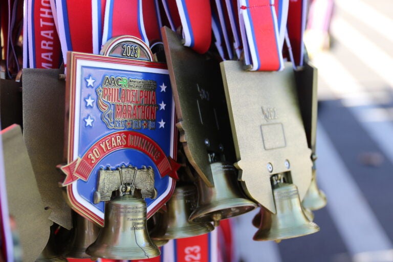 The medals feature little bells that ring with each step the runner takes after crossing the finish line.