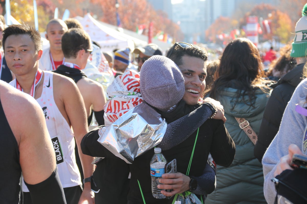 These two shared a loving embrace after one of them crossed the finish line at the AACR Philadelphia Marathon on Sunday.