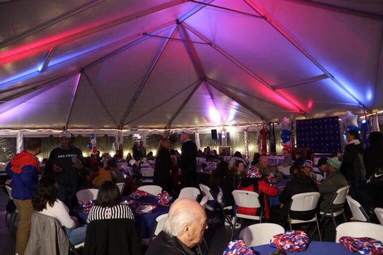 The Philadelphia 76ers and Toyota served a Thanksgiving dinner to military service members and veterans onboard the Battleship New Jersey on Monday night in Camden, New Jersey. (Cory Sharber/WHYY)
