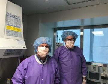 -Stephan Kadauke (left) and Steve Grupp of the Children’s Hospital of Philadelphia in the clean room facility where immune therapy treatments are produced. (Maiken Scott/WHYY)