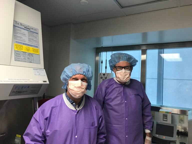 -Stephan Kadauke (left) and Steve Grupp of the Children’s Hospital of Philadelphia in the clean room facility where immune therapy treatments are produced. (Maiken Scott/WHYY)