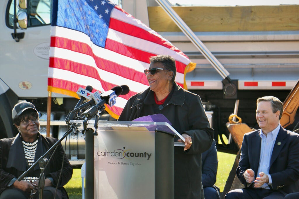 Ann Wardlow speaking at a podium