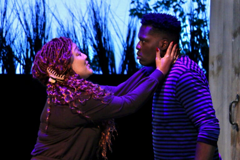 Tedra (Donnie Hammond) tries to calm the madness of her son, Juicy (Brenson Thomas) during a rehearsal