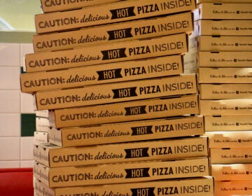 A stack of pizza boxes