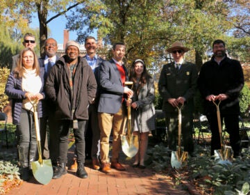 National Park officials, donors, organizers and planners gather to break ground for the Bicentennial Bell Garden