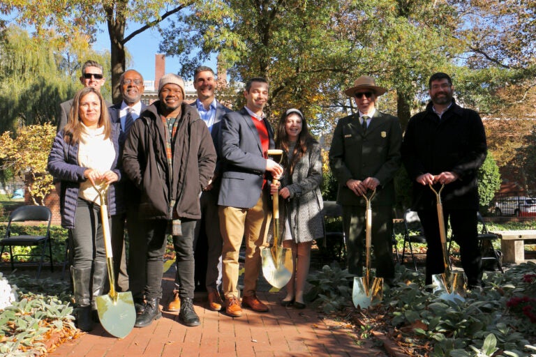 National Park officials, donors, organizers and planners gather to break ground for the Bicentennial Bell Garden