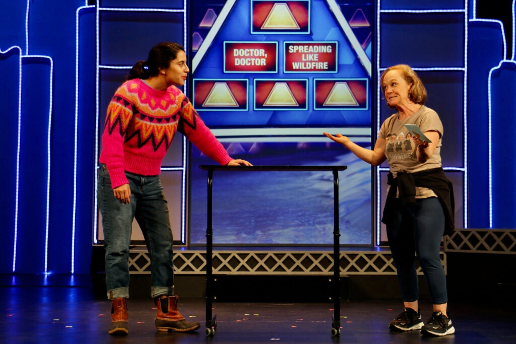 Jennifer Childs (right), cofounder and producing artistic director of 1812 Productions, rehearses a skit with Robyn Unger.