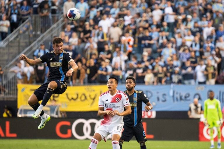 Philadelphia Union's Kai Wagner (27) heads the ball during an MLS playoff soccer game against the New England Revolution, Saturday, Oct. 28, 2023, in Philadelphia.