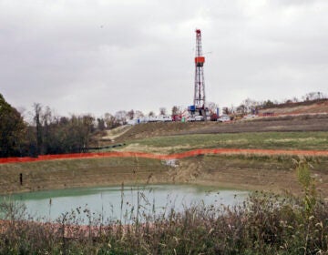 In this Oct. 29, 2008, file photo, a drilling rig used to extract natural gas from the Marcellus Shale, located on a hill above a pond on John Dunn's farm in the Washington County borough of Houston, Pa.