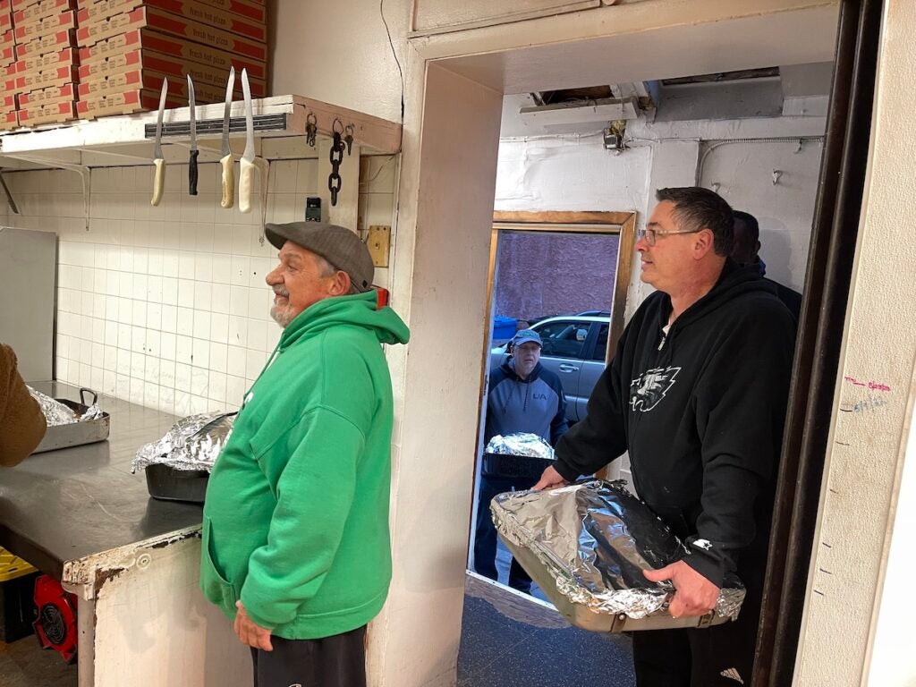 Joseph Conti waited in line to drop off his turkey