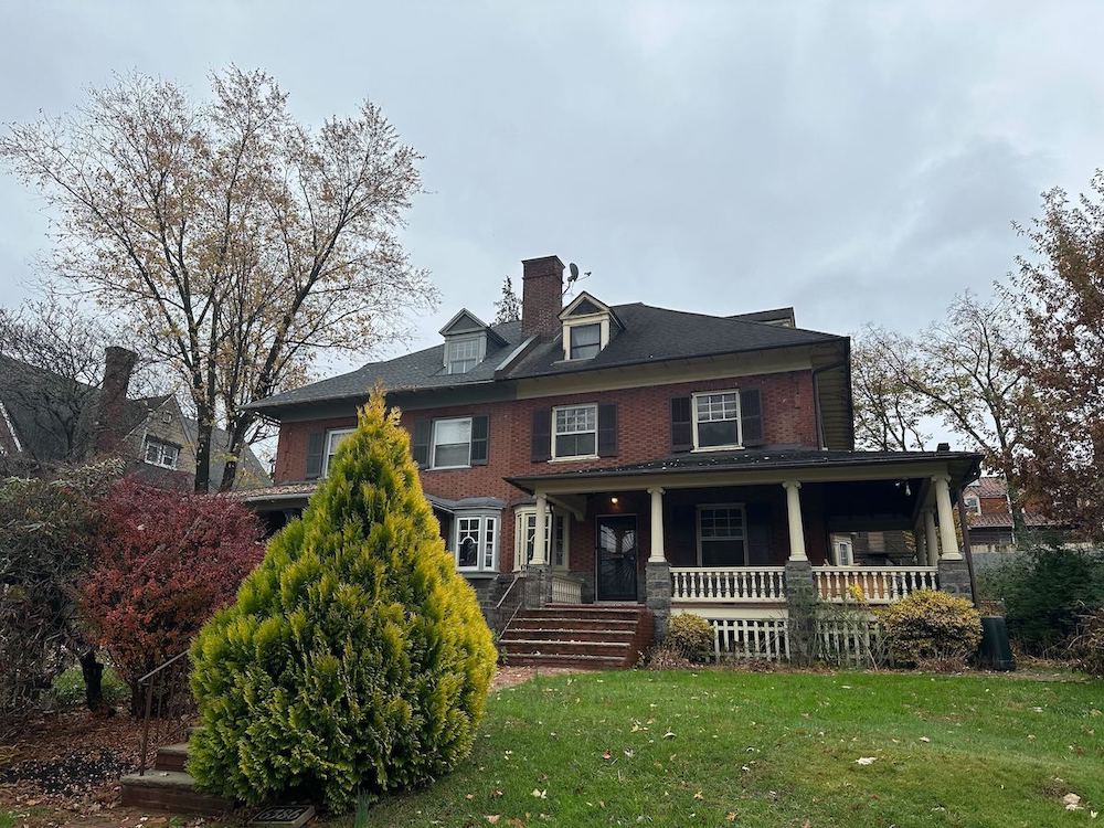 A large house with a large lawn