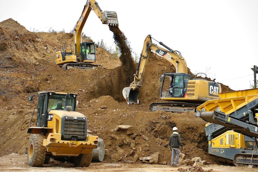 An illegal dump at the corner of Seventh and Chestnut streets in Camden is being cleared.