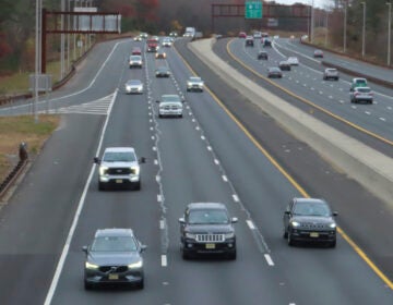 Cars drive on the highway