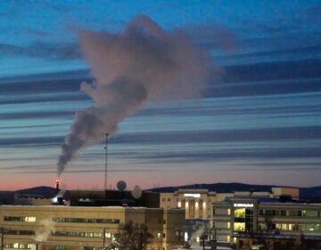 power plant emissions against the sky