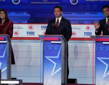 In this photo from the second GOP primary debate on Sept. 27, former U.N. Ambassador Nikki Haley, left, argues a point with businessman Vivek Ramaswamy, right, with Florida Gov. Ron DeSantis at center. (Mark J. Terrill/AP)