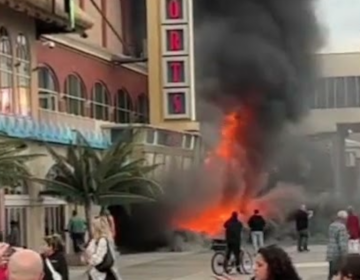 A fire erupts on an Atlantic City boardwalk.