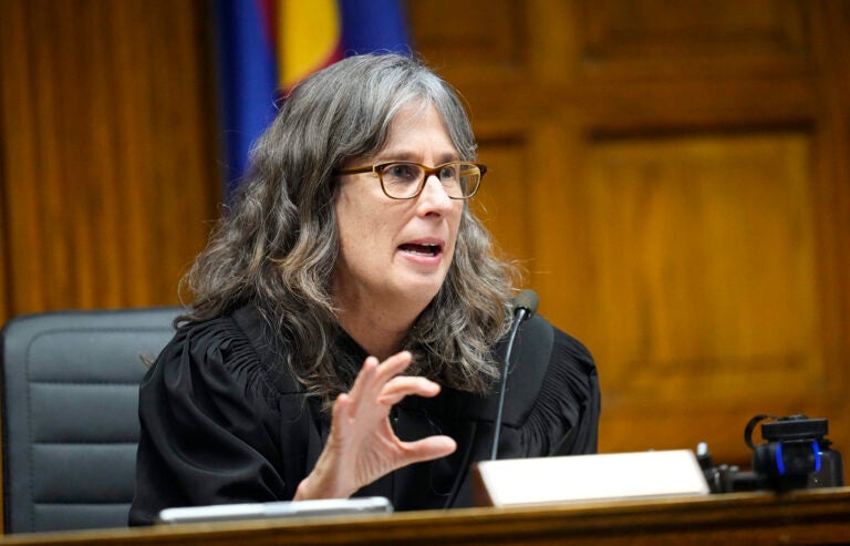 Judge Sarah B. Wallace presides over closing arguments