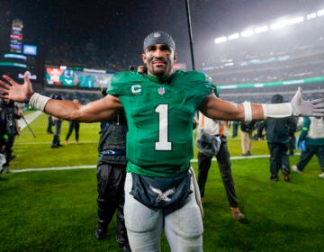 Philadelphia Eagles quarterback Jalen Hurts celebrates after scoring the game-winning touchdown against the Buffalo Bills