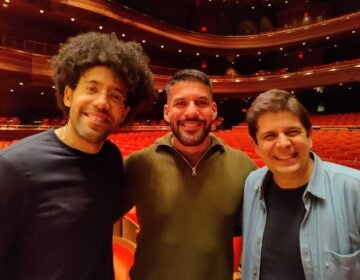 Jimmy López Bellido, center, with conductor Raphael Payare, left, and pianist Javier Perianes, right.