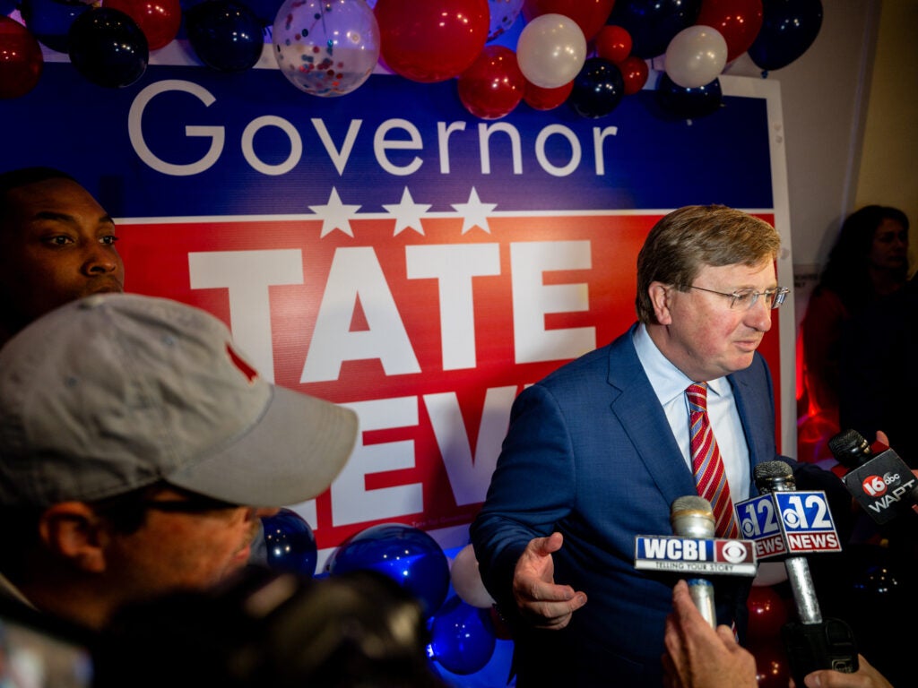 Mississippi Gov. Tate Reeves speaks at a podium