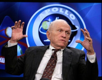 Apollo 8 crew member Frank Borman speaks during a 2008 NASA TV program at the Newseum in Washington, DC. The former astronauts participated in a discussion on the 1968 lunar orbital mission and how the success of Apollo 8 contributed to the overall moon landing effort.