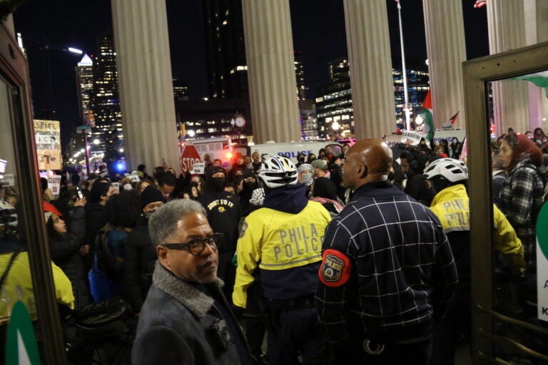 Protesters gathered outside of 30th Street Station along with police