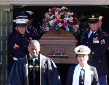 Pallbearers carry Rosalynn Carter's casket