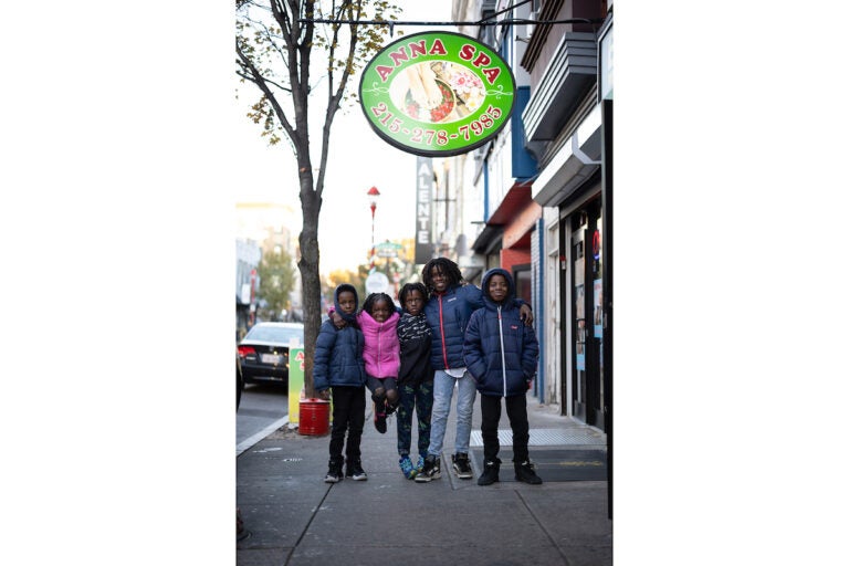 A group of kids pose for a photo