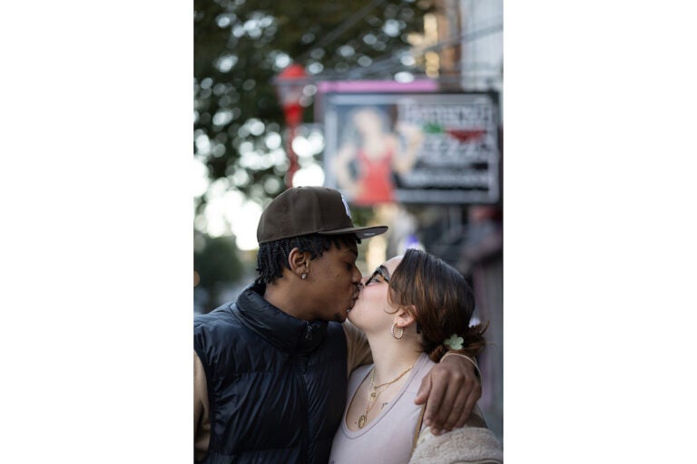 couple kissing on south street