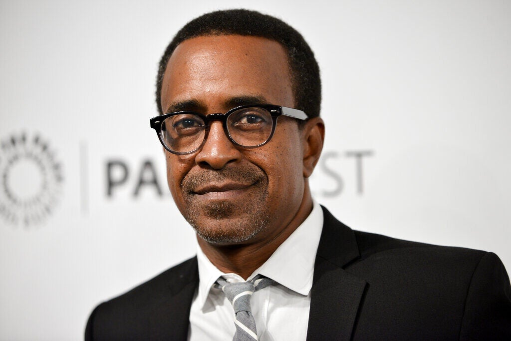 Tim Meadows smiles while posing for a photo