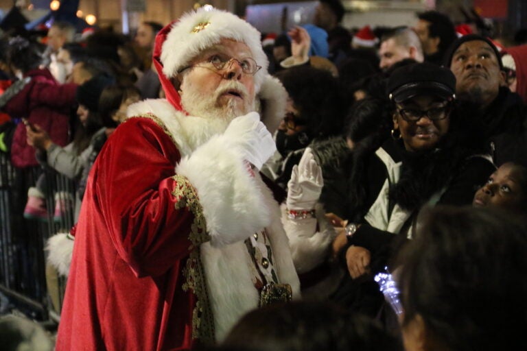 Santa Claus looks skyward