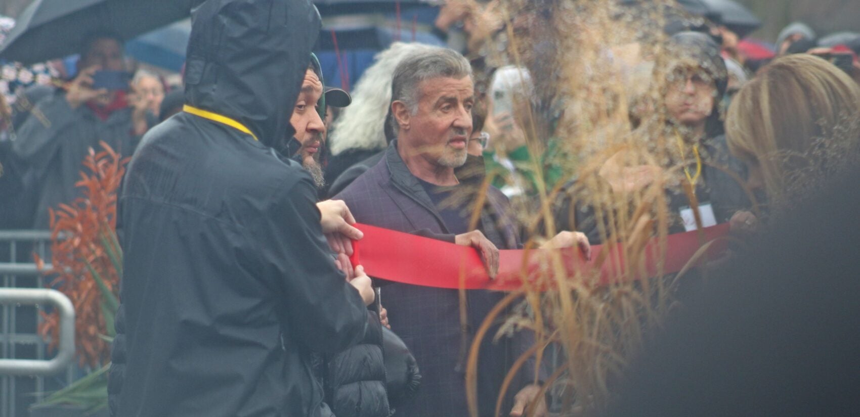 Sylvester Stallone helped cut the ribbon for the Rocky Shop on Dec. 3, 2023. (Cory Sharber/WHYY)