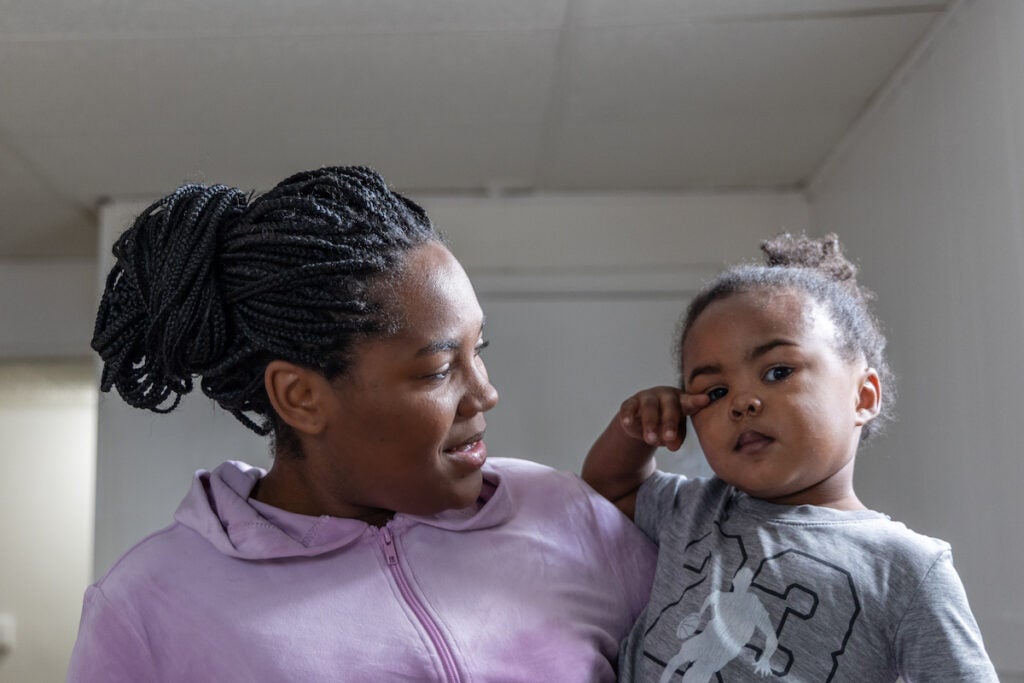 Lachnee Nelson, 24, with her son Legend, 2