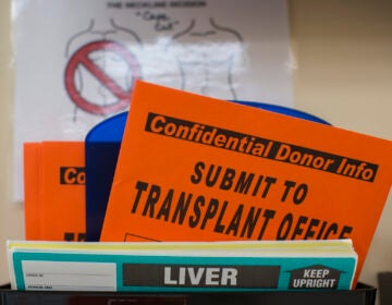 This Friday, Feb. 21, 2014 photo shows organ donation paperwork at Mid-America Transplant Services in St. Louis. (AP Photo/Whitney Curtis)