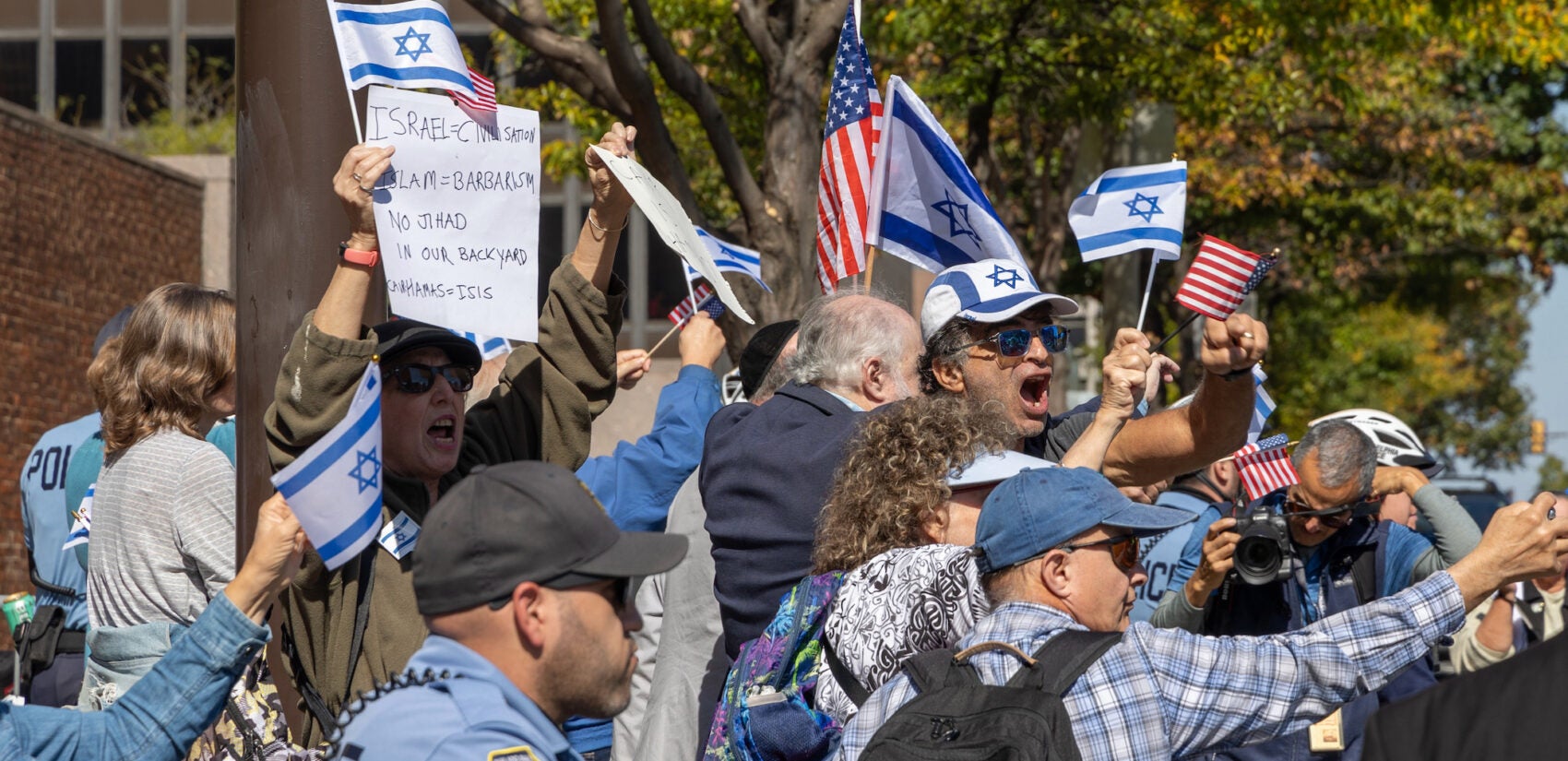 Israeli supporters counter a protest in support of Palestine.