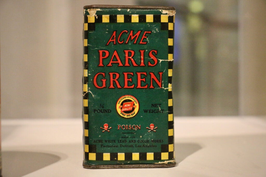 A bottle that reads "ACME Paris green, poison"