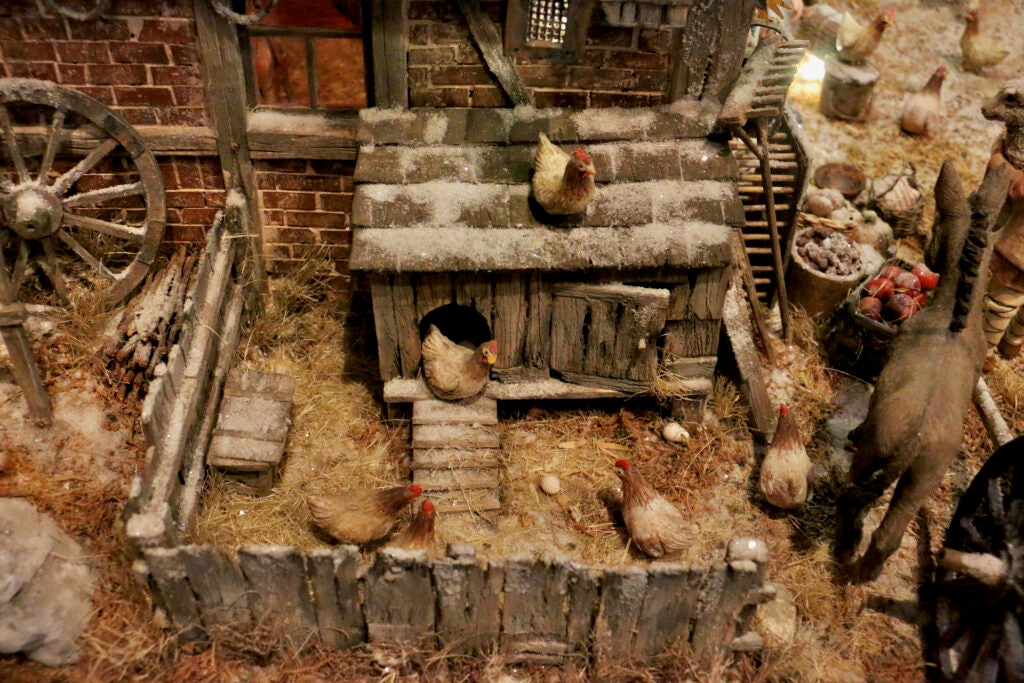 A tiny chicken coop in a nativity scene