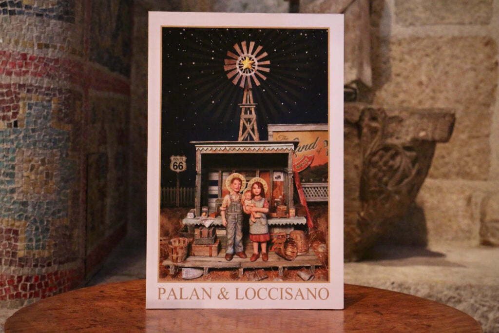 An image of a nativity scene and the words Palan & Loccisano written below