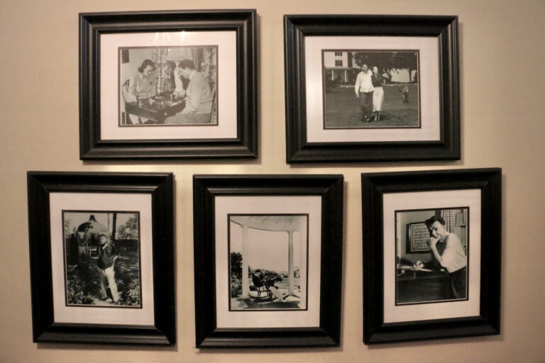 Photos of Oscar Hammerstein and family hang on a wall