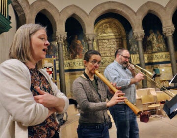 Soprano Clara Rottsolk (left)sings with Heloise Degrugillier (tenor recorder) and Greg Ingles (tenor Sackbut) and other members of Piffaro The Renaissance Band. (Emma Lee/WHYY)